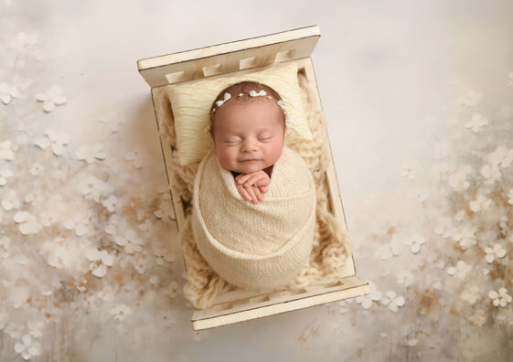 girl newborn with flowers
